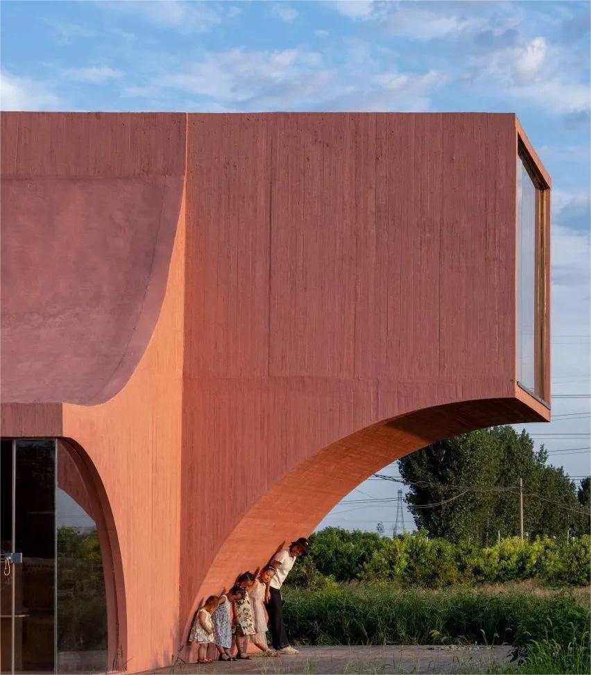 Pink Concrete Pavilion designed by Atelier Xi in rural China